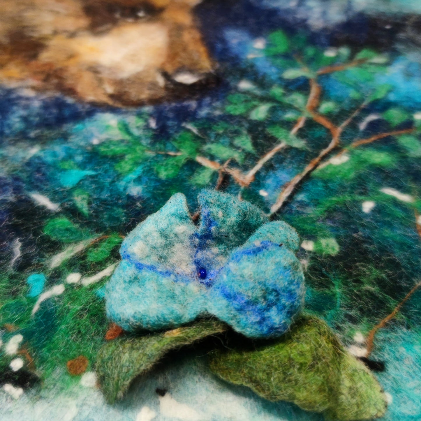 Wool Painting ”Enchanted by the Blue Bloom”, from the Whimsical Wildlife in Bloom collection